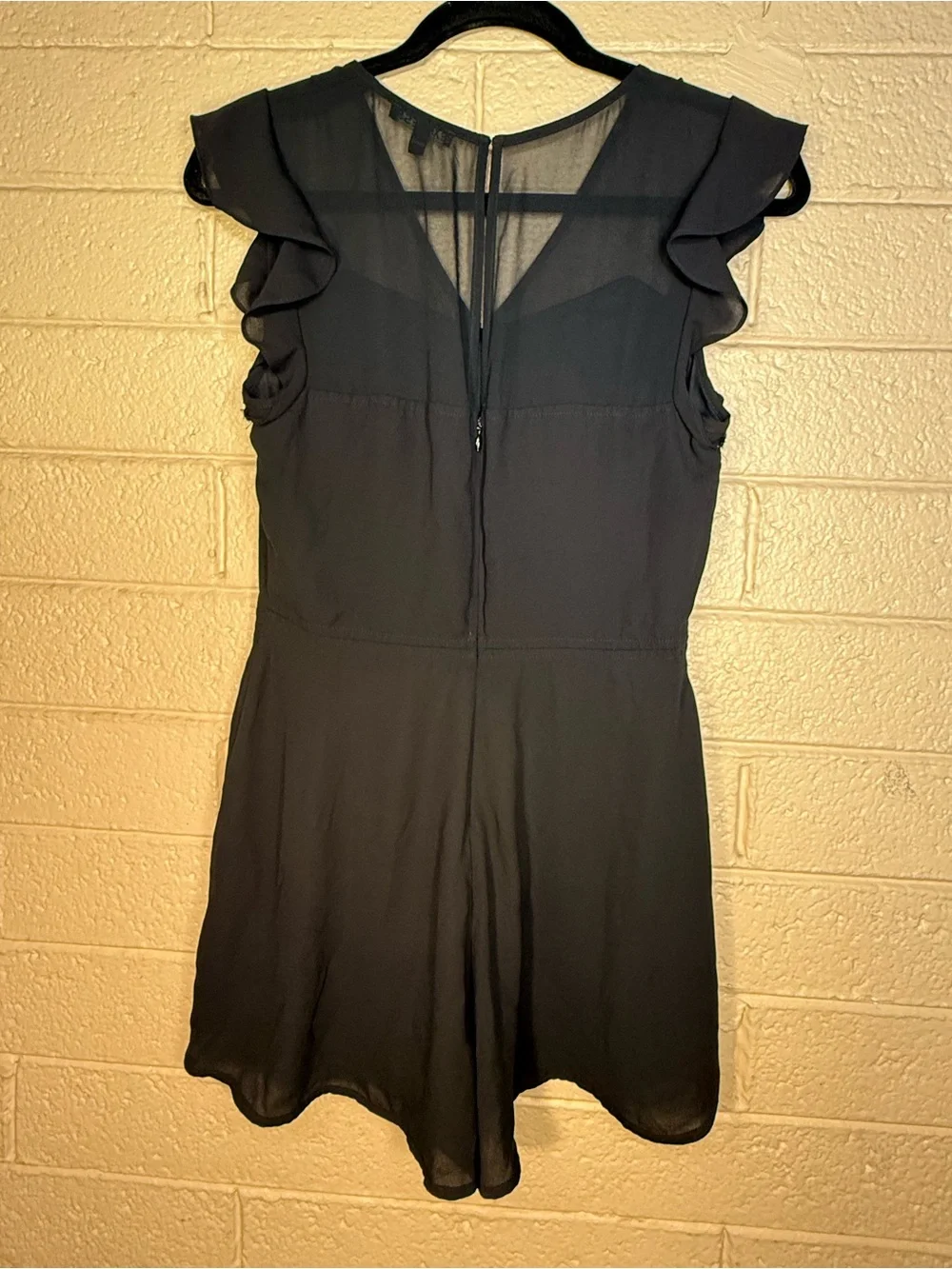 Express Black V-Neck Ruffle Sleeve Mini romper.